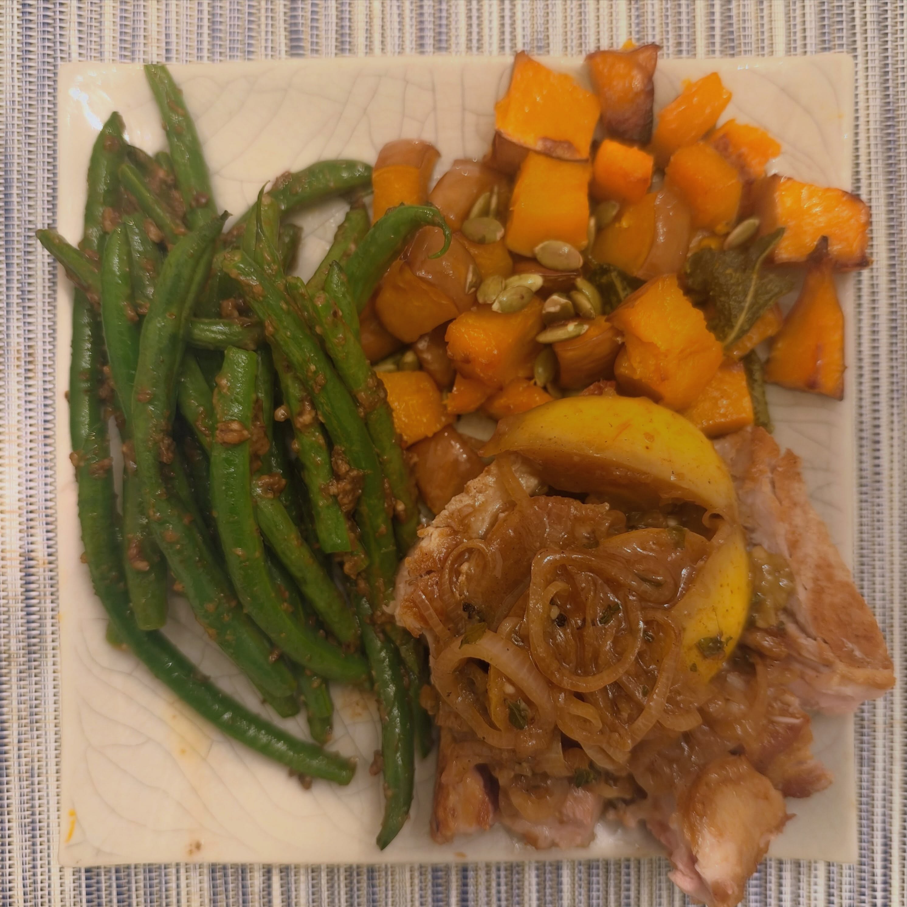 Pan-Seared Pork Chops with Apples and Miso Butter, Roasted Koginut Squash, and Ryeso Brown Butter Beans